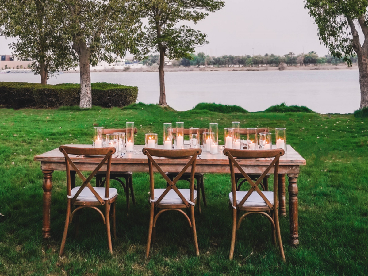 table outdoor desgin events dinner setup candles abudhabi dubai